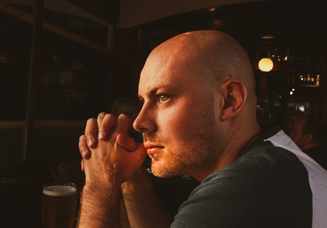 Portrait of a man with short hair and a beard